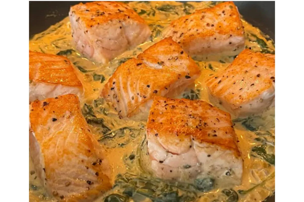 Delicious salmon pieces cooked in a creamy, spicy spinach sauce